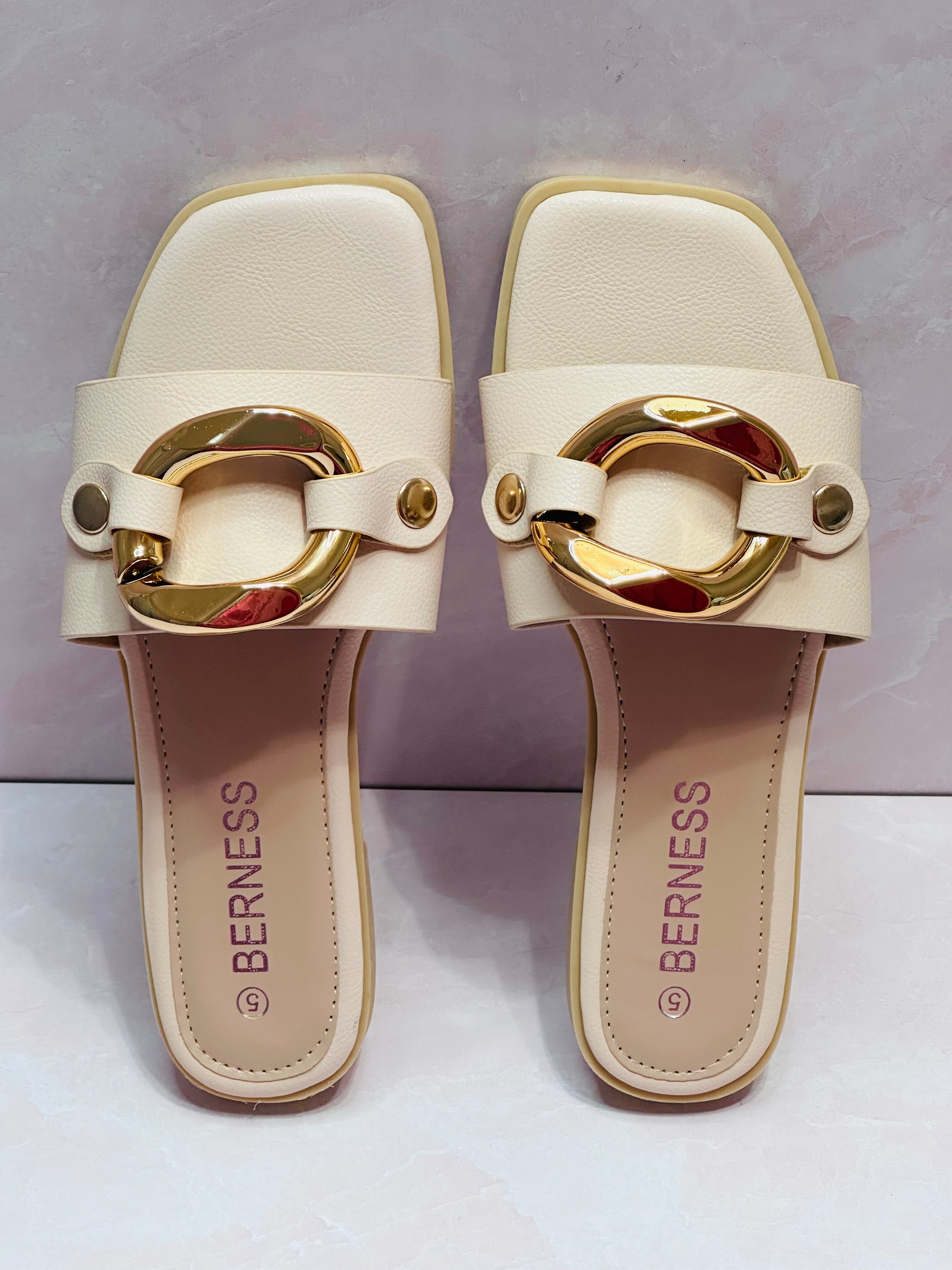 Neutral gold accent slide on sandals by Britt and Belle Boutique