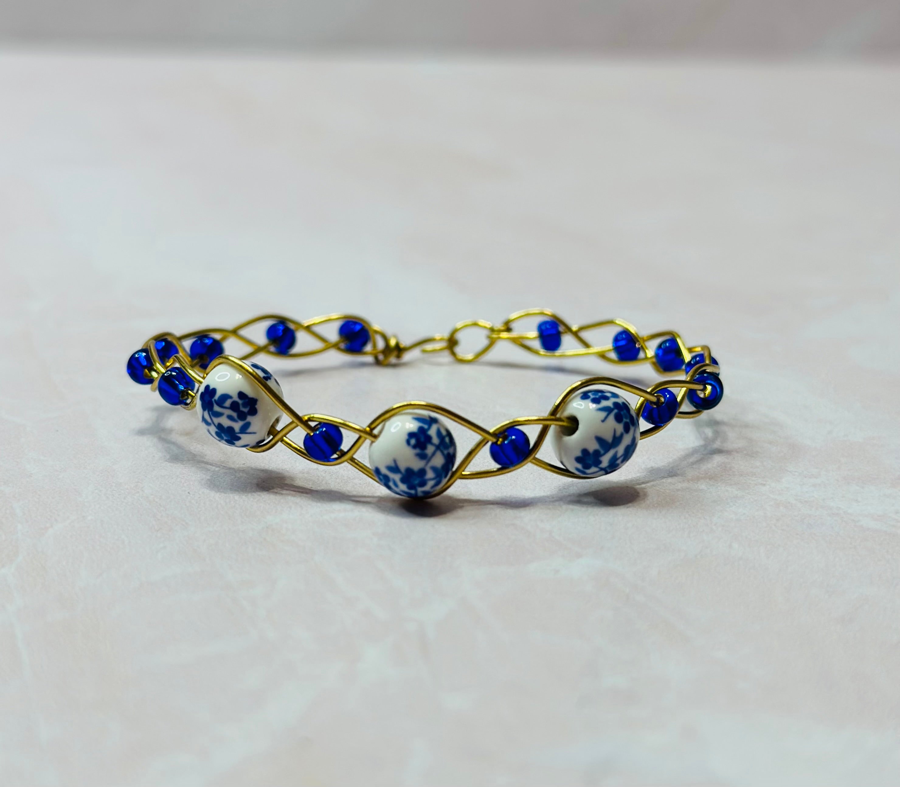 Blue Spring Blossom Wire Wrapped Bracelet by Britt and Belle Boutique