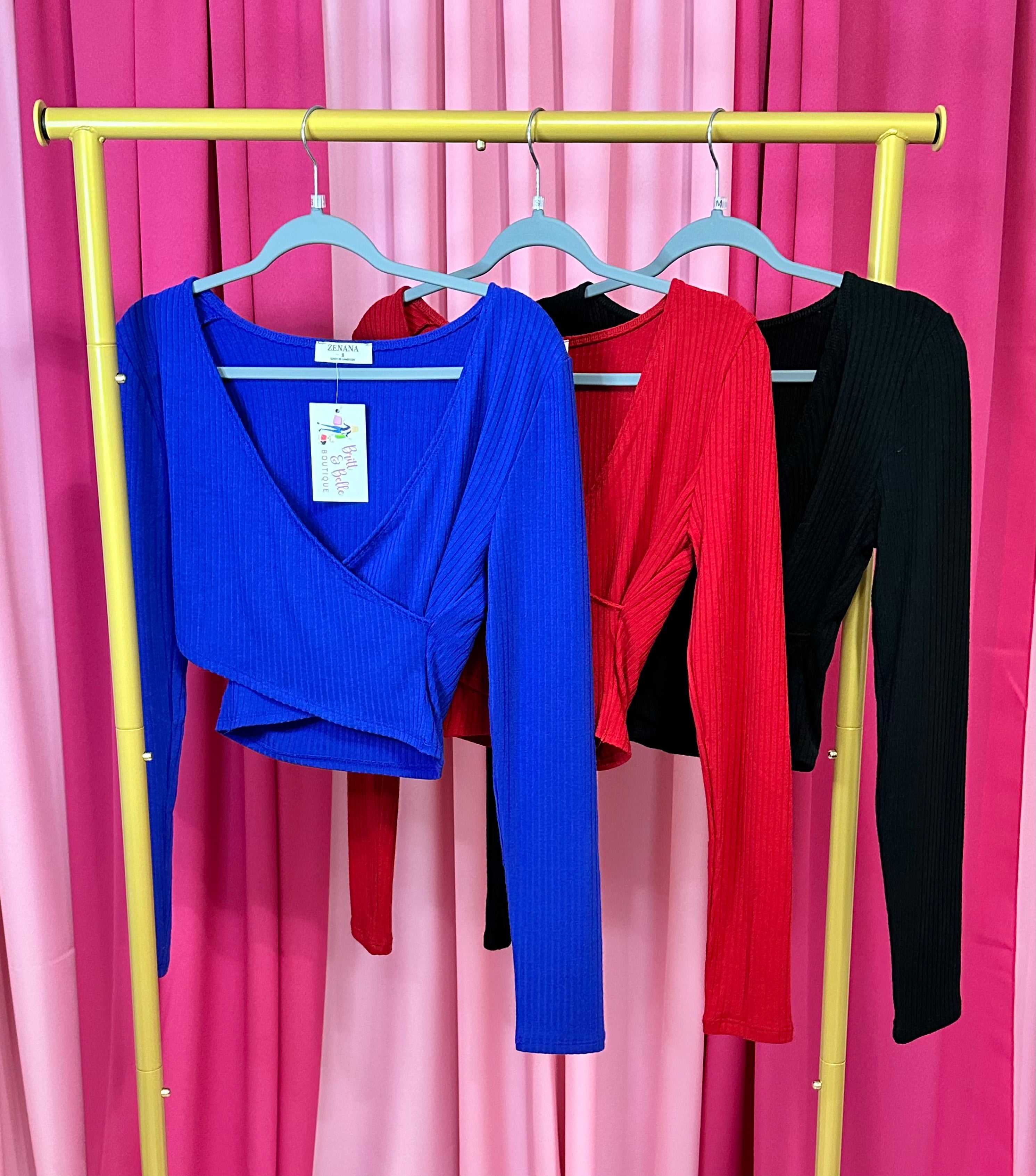 Long sleeve crop tops in blue, red, and black