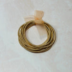 Thick Nude Pink 10 Piece Guitar String Bracelets Set by Britt and Belle Boutique