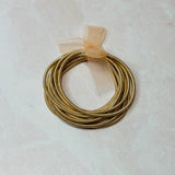Thick Nude Pink 10 Piece Guitar String Bracelets Set by Britt and Belle Boutique