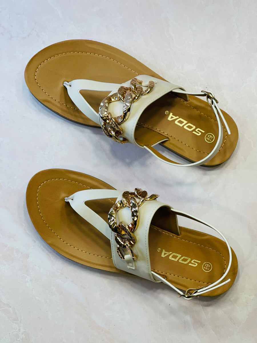 white sandals; gold chain sandals