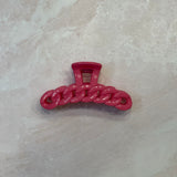 pink claw clip; pink hair clip