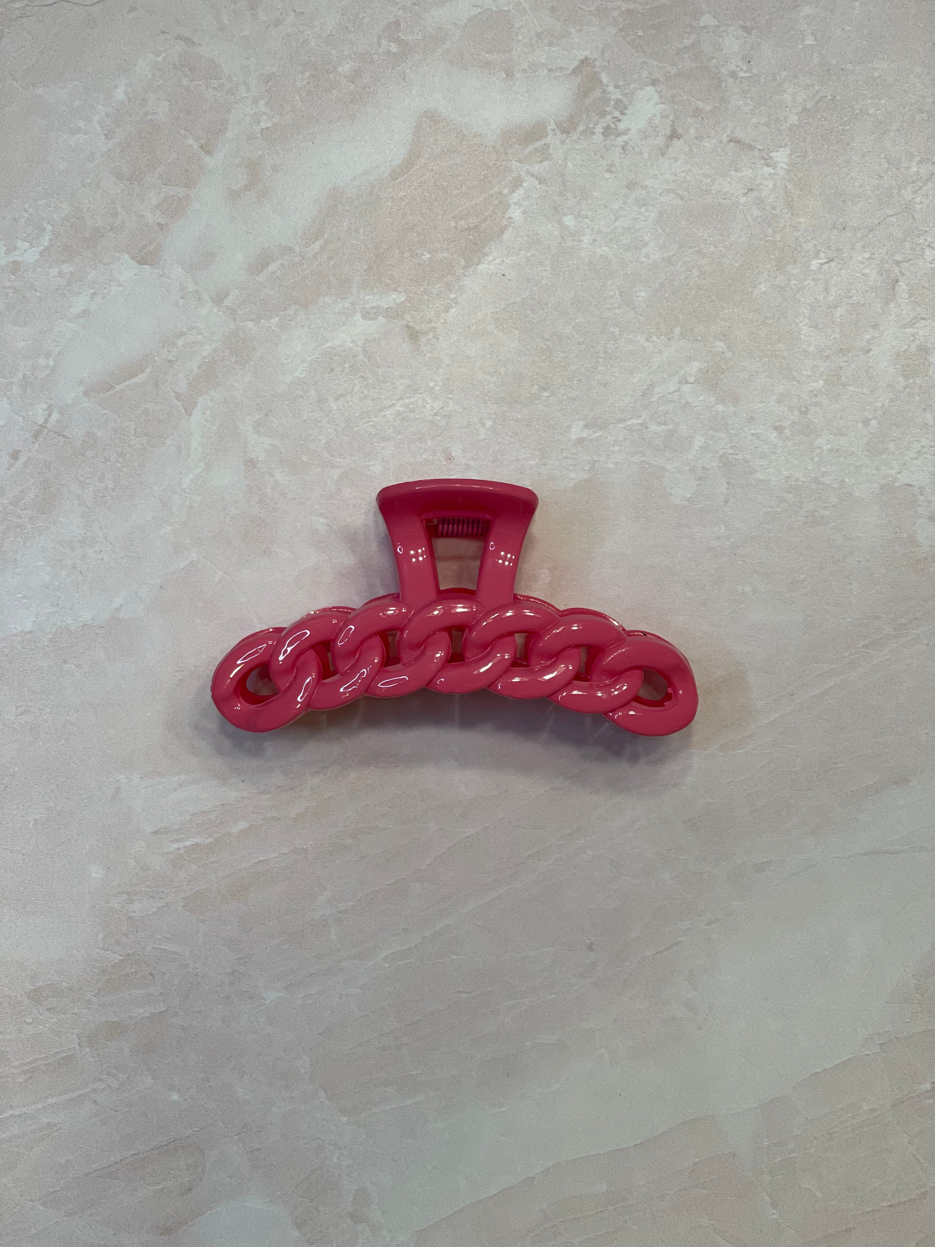 pink claw clip; pink hair clip