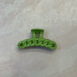 green claw clip; green hair clip
